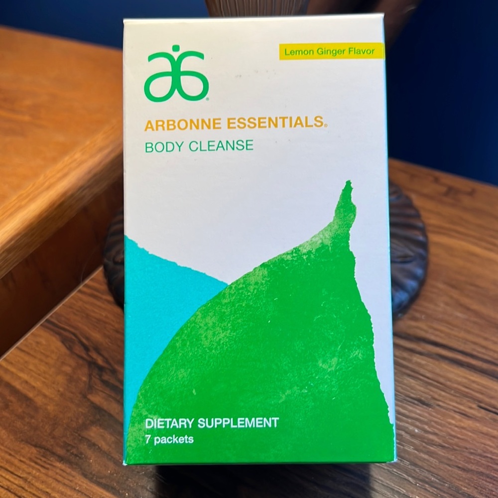 New (seal came unglued) Arbonne Essentials Lemon Ginger Flavor